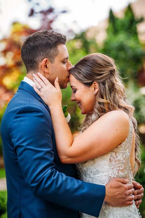 bride and groom kissing